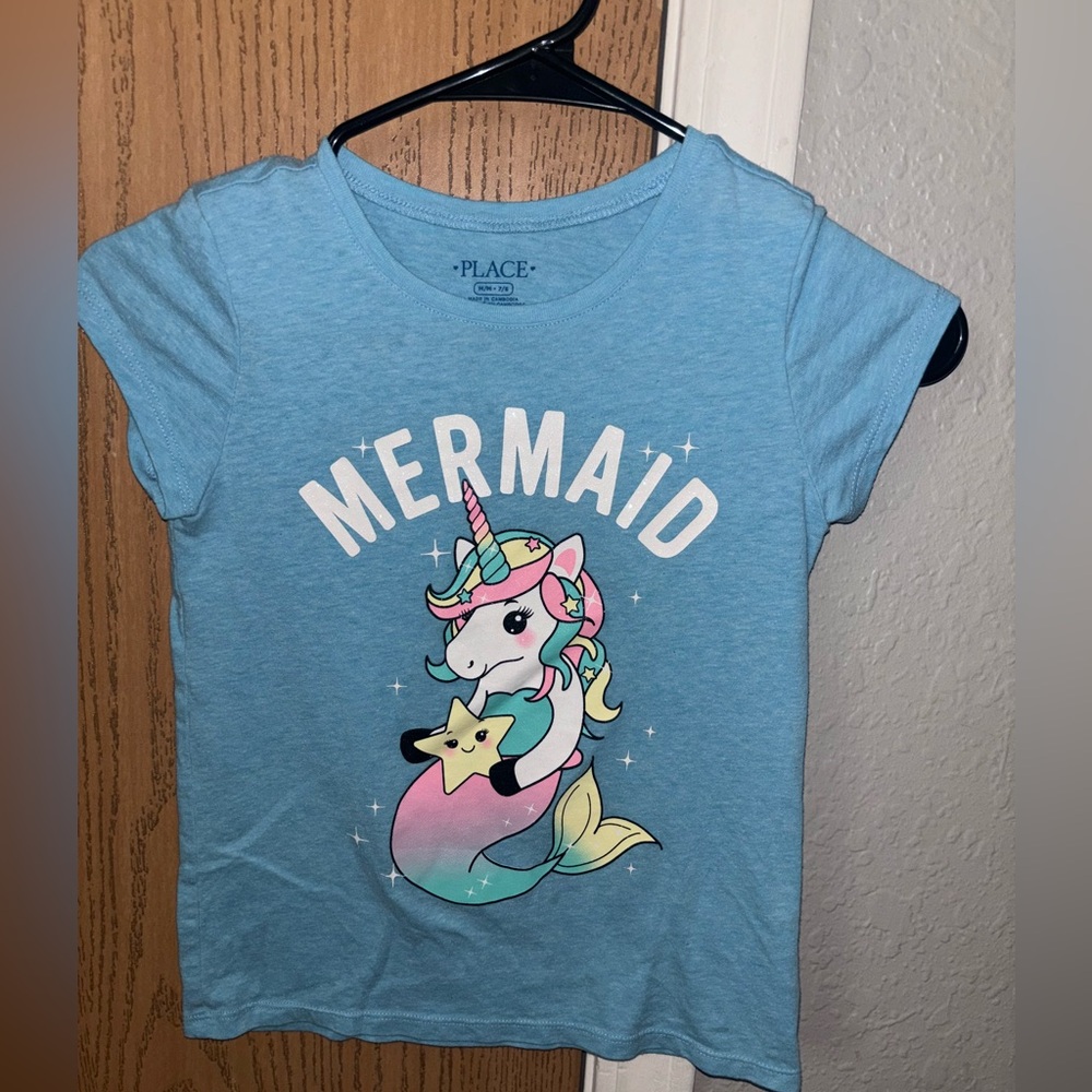 Unicorn shirt.